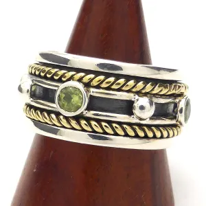 Peridots Ring, Faceted Rounds in spinning band, 925 Silver g3