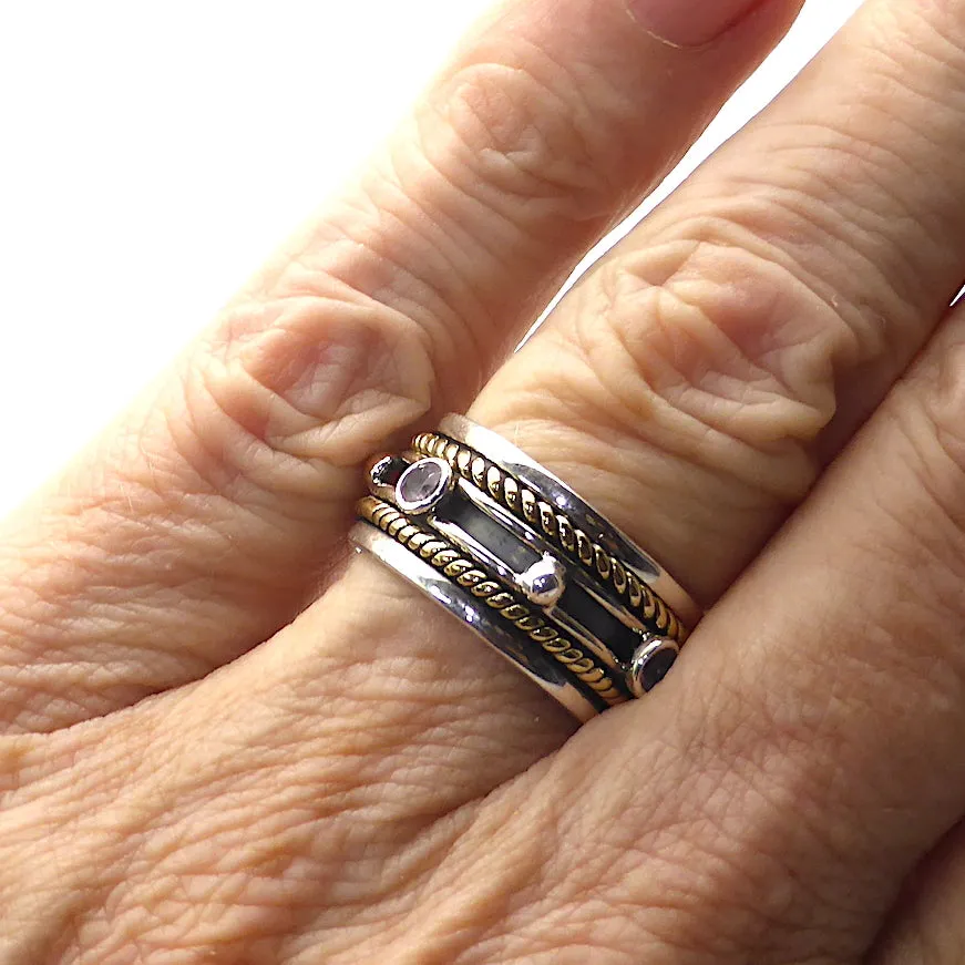 Peridots Ring, Faceted Rounds in spinning band, 925 Silver g3